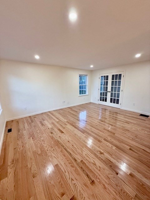38 Colonial Road Webster, MA 01570 - Photo 17 of 33 a view of an empty room with wooden floor and a window