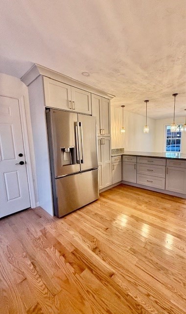 38 Colonial Road Webster, MA 01570 - Photo 9 of 33 a view of a kitchen with wooden floor and electronic appliances