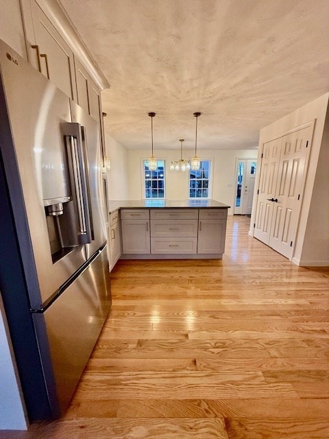 38 Colonial Road Webster, MA 01570 - Photo 10 of 33 a view of a kitchen with wooden floor and staircase