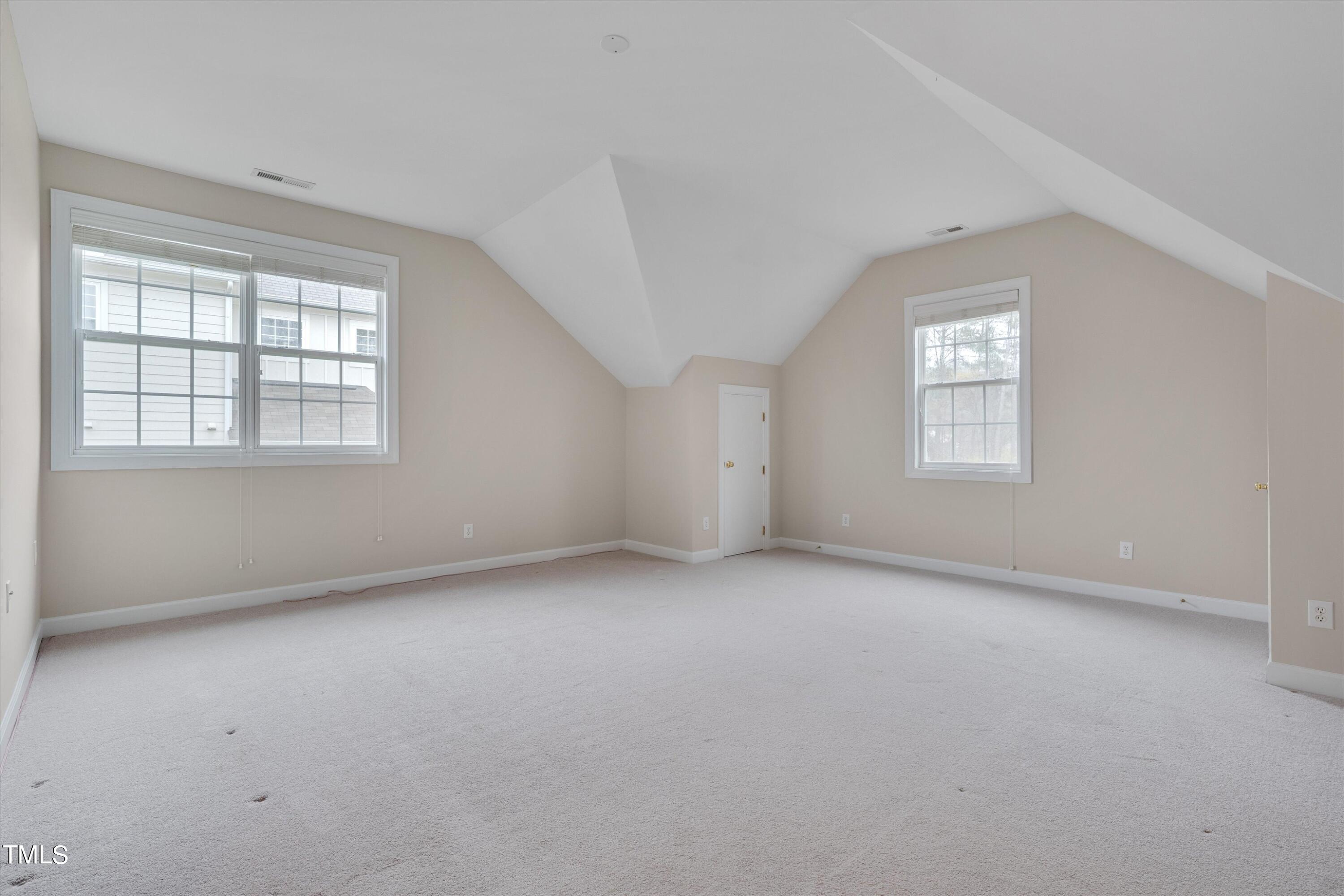 518 Panthers Run Drive Durham, NC 27713 - Photo 27 of 39 an empty room with windows