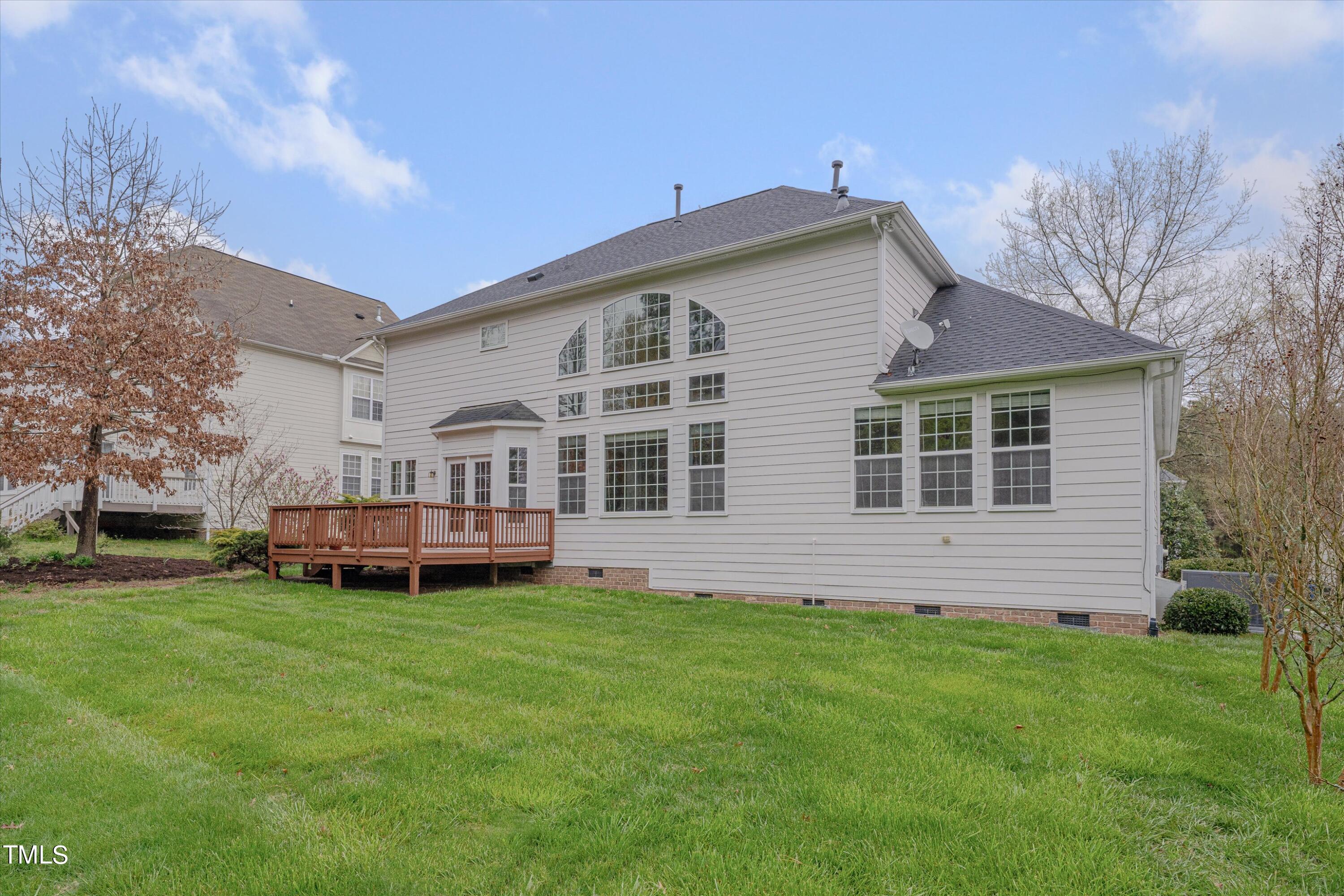 518 Panthers Run Drive Durham, NC 27713 - Photo 34 of 39 a view of a house with a yard and sitting area