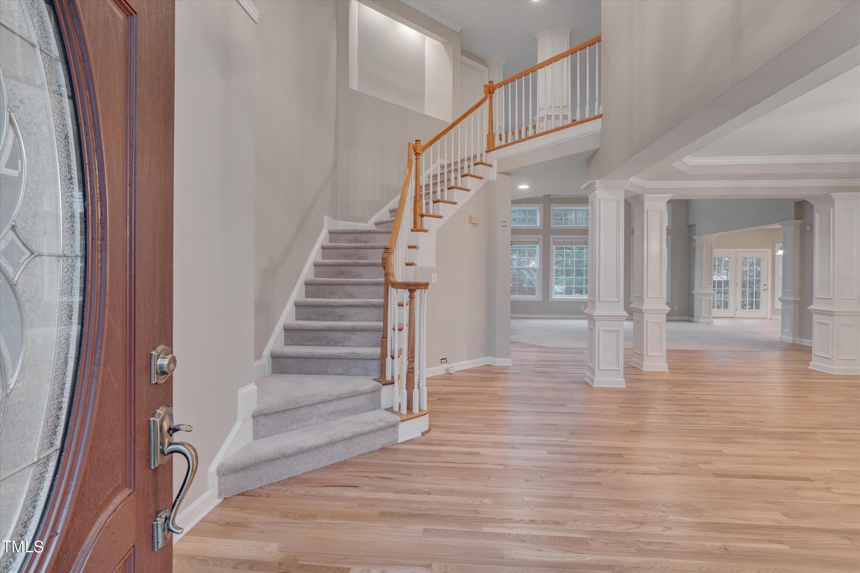 518 Panthers Run Drive Durham, NC 27713 - Photo 4 of 39 a view of entryway and hall with wooden floor