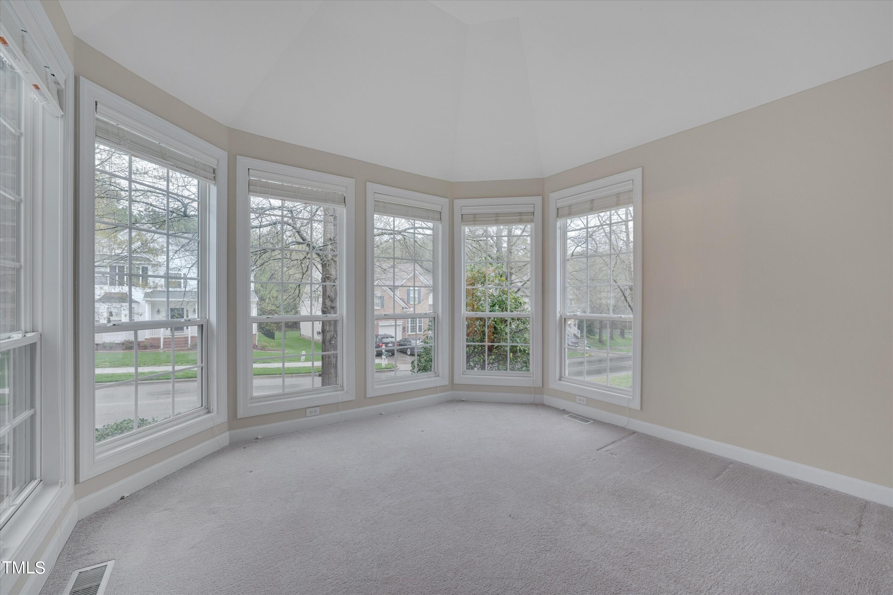 518 Panthers Run Drive Durham, NC 27713 - Photo 6 of 39 a view of room with window and floor to ceiling window