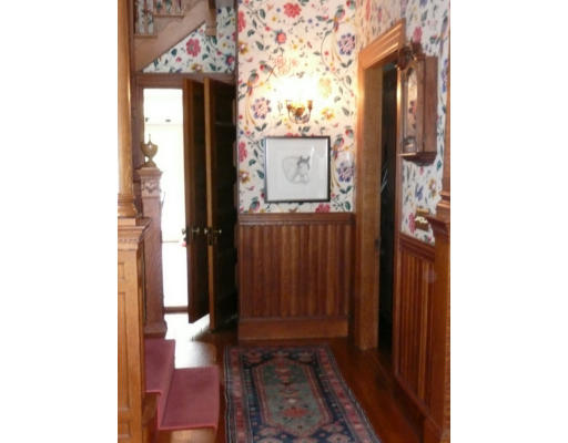 161 Buckminster Road Brookline, MA 02445 - Photo 8 of 19 a view of a hallway with wooden floor