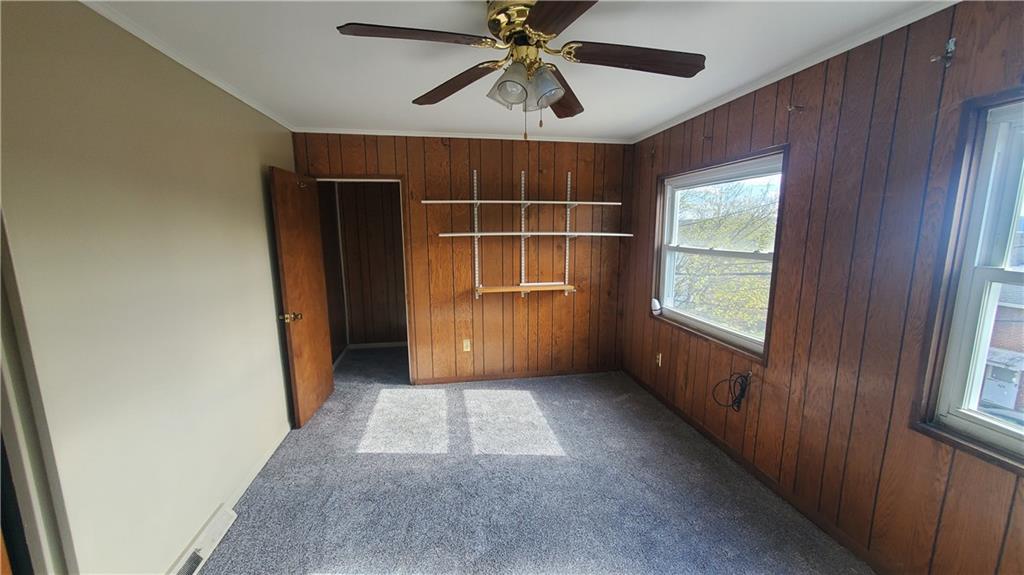 936 Ormond Street Brackenridge, PA 15014 - Photo 18 of 24 wooden floor in an empty room with a window