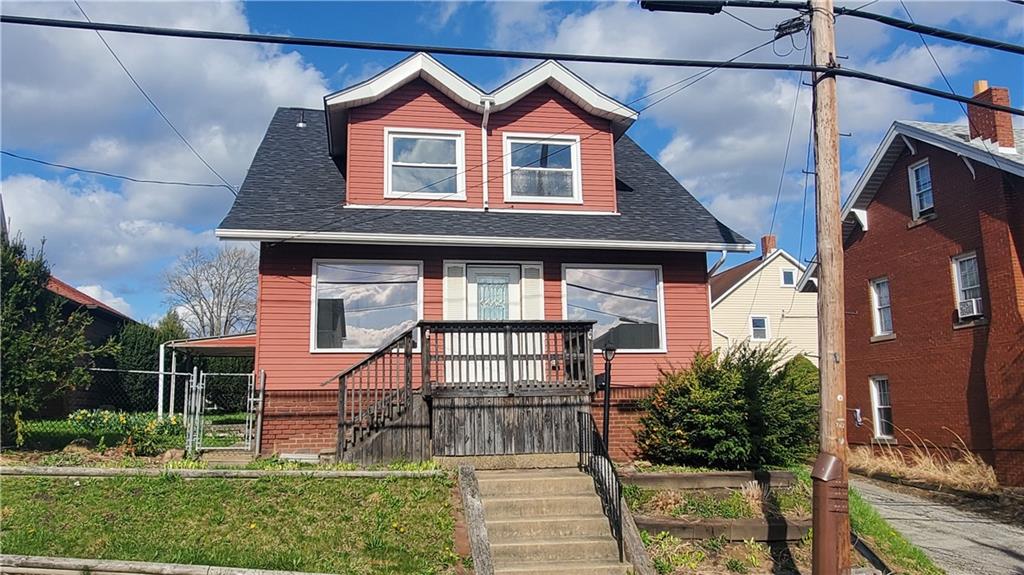 936 Ormond Street Brackenridge, PA 15014 - Photo 2 of 24 a front view of a house with a yard