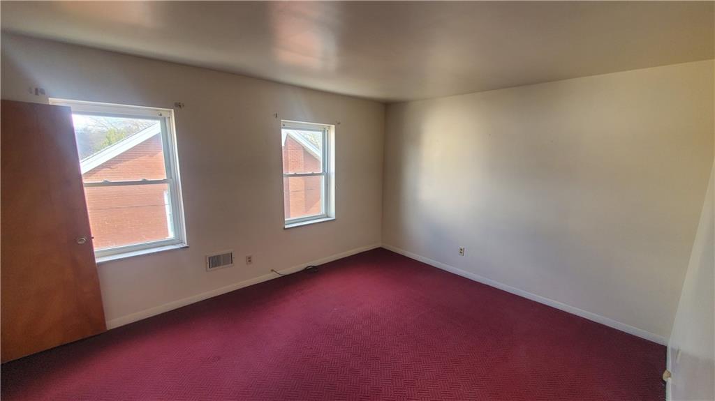 936 Ormond Street Brackenridge, PA 15014 - Photo 21 of 24 an empty room with windows