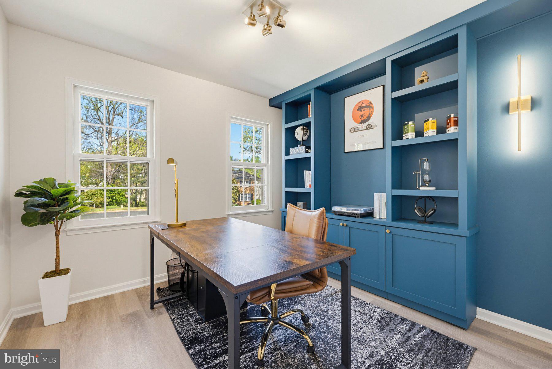7305 Langsford Court Springfield, VA 22153 - Photo 23 of 46 a view of a workspace room with furniture and wooden floor