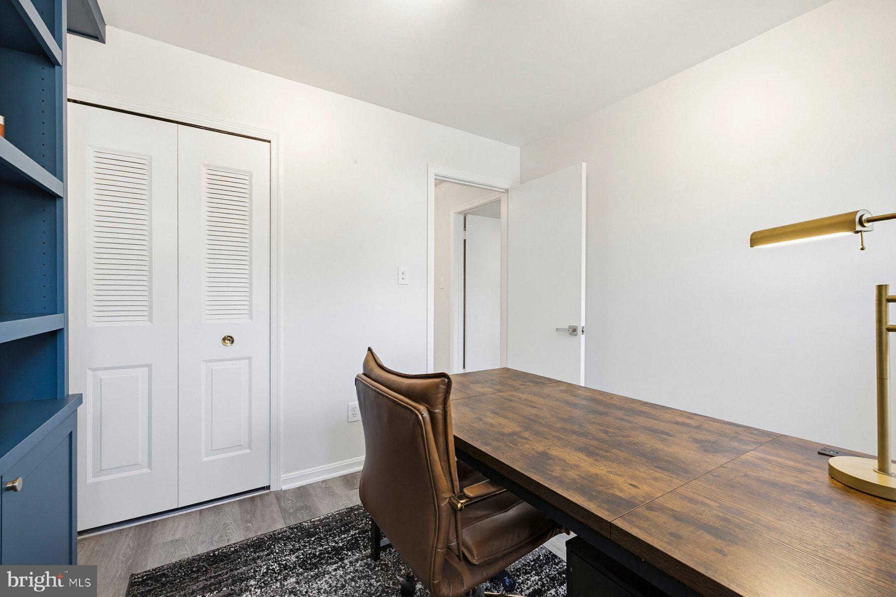 7305 Langsford Court Springfield, VA 22153 - Photo 25 of 46 a workspace with furniture and wooden floor