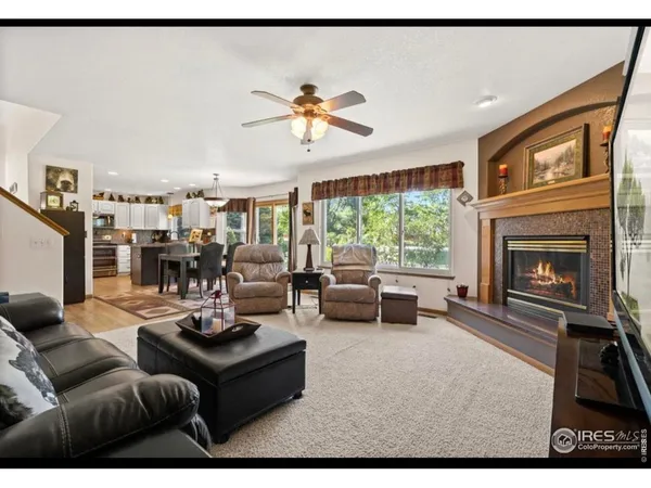 a kitchen with a table and chairs in it
