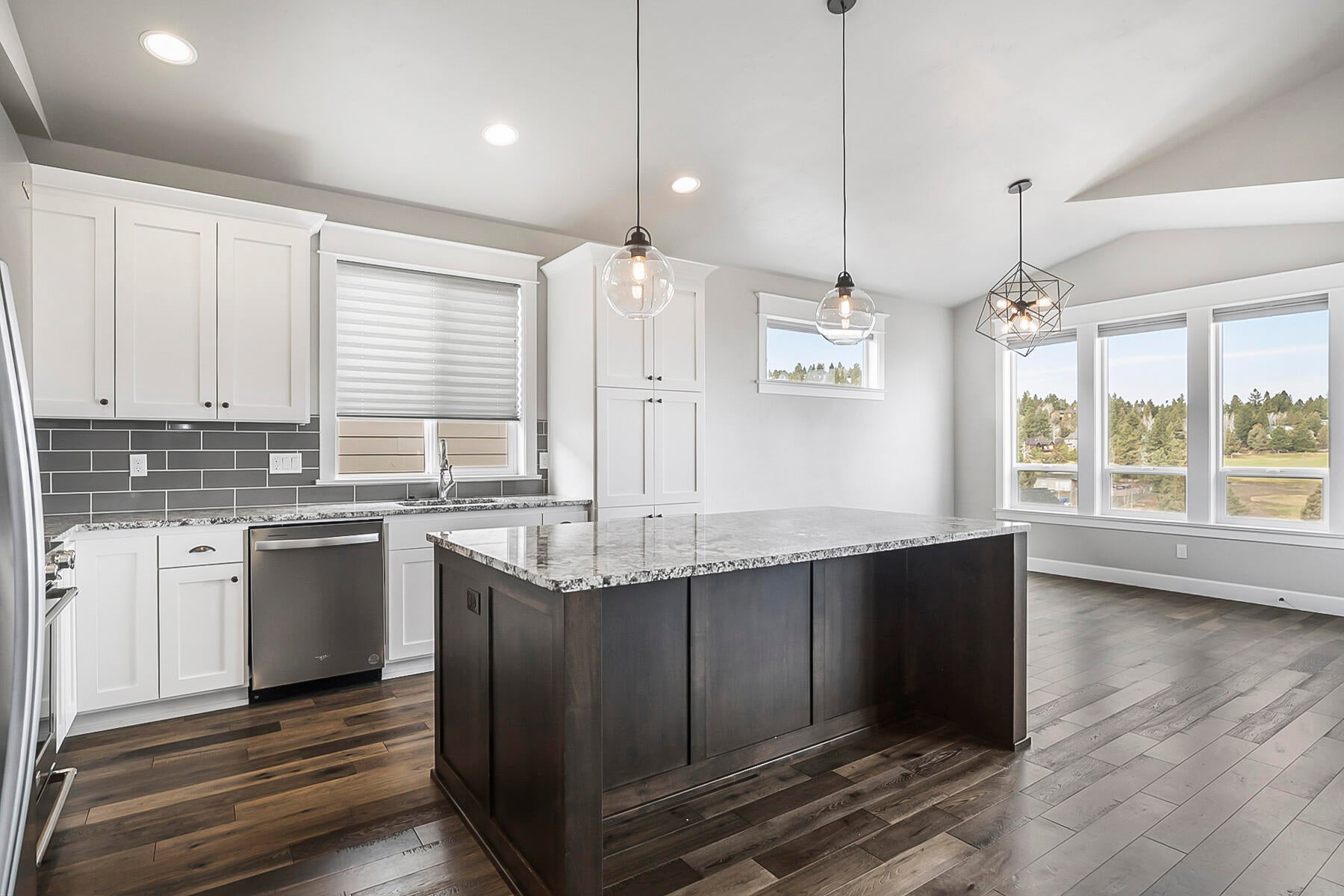 2612 Northwest Compass Corner Loop Bend, OR 97703 - Photo 15 of 44 room to move with the Granite Island and stainless appliances