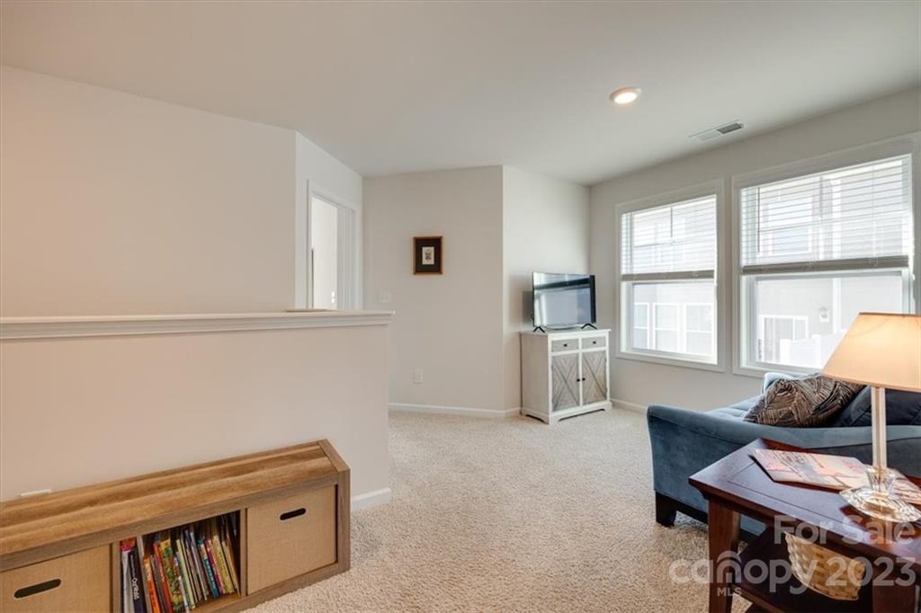 311 Bulrush Rd Lake Lake Wylie, SC 29710 - Photo 17 of 35 a livingroom with furniture and a large window