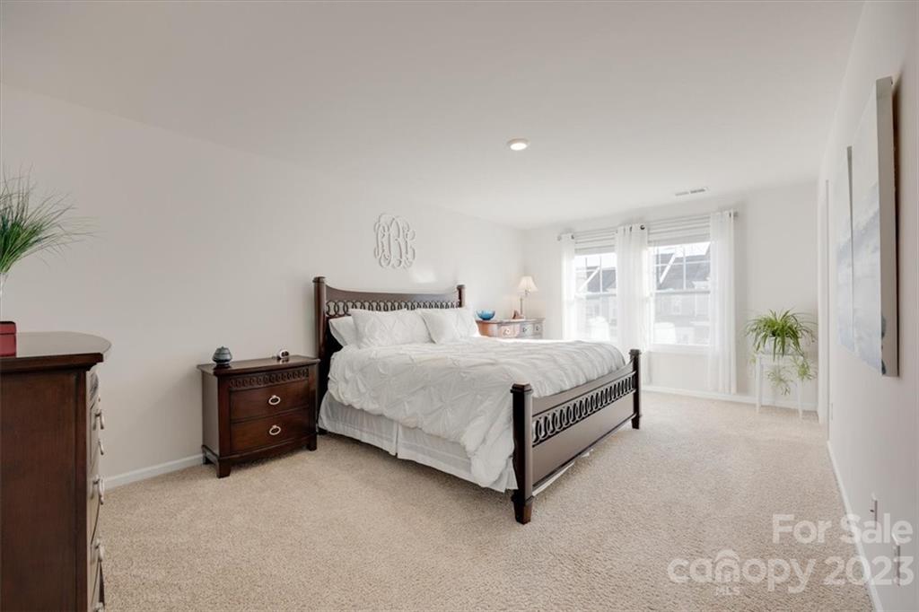 311 Bulrush Rd Lake Lake Wylie, SC 29710 - Photo 18 of 35 a bedroom with a bed and window