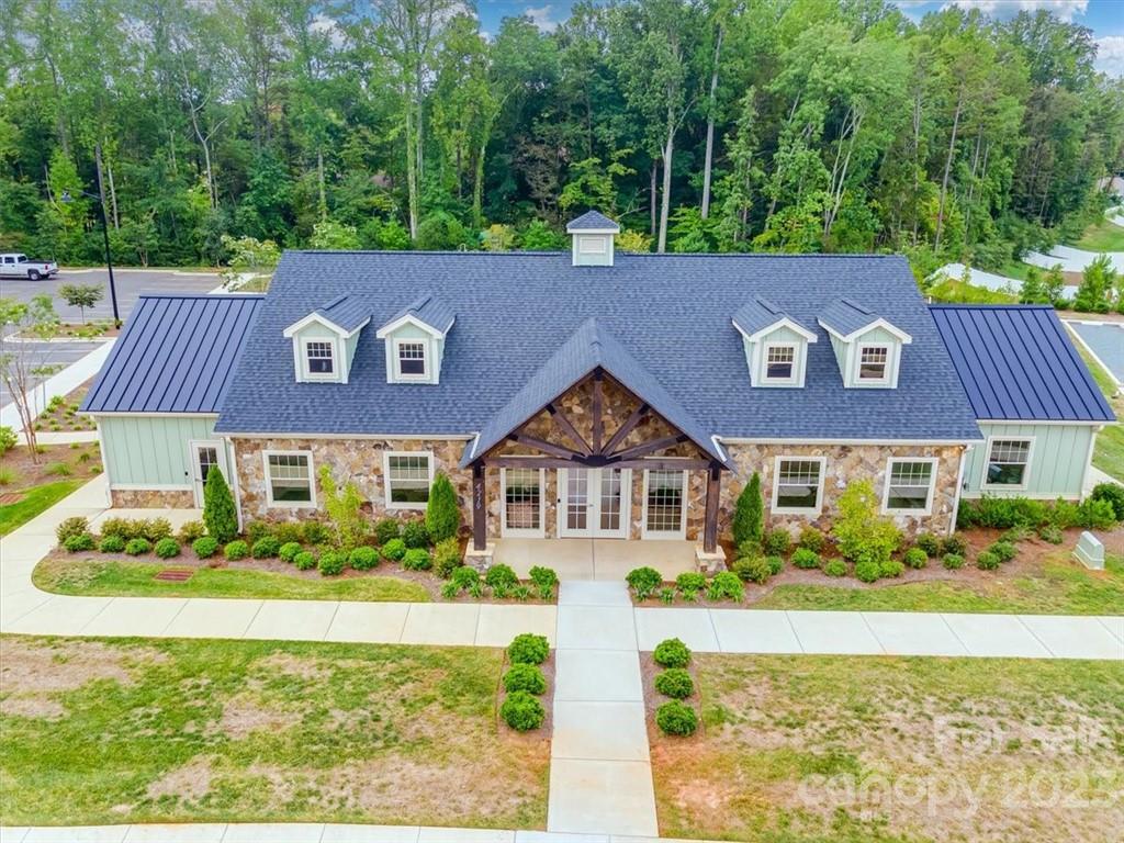 311 Bulrush Rd Lake Lake Wylie, SC 29710 - Photo 34 of 35 a front view of a house with garden