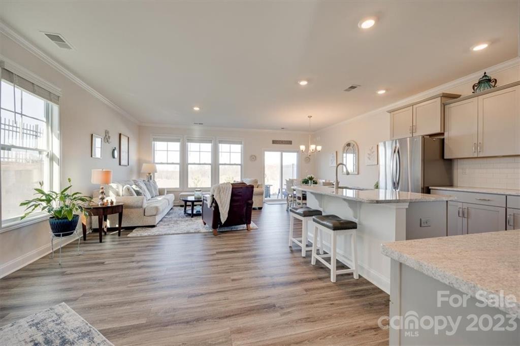 311 Bulrush Rd Lake Lake Wylie, SC 29710 - Photo 5 of 35 a large kitchen with lots of counter space dining table and chairs