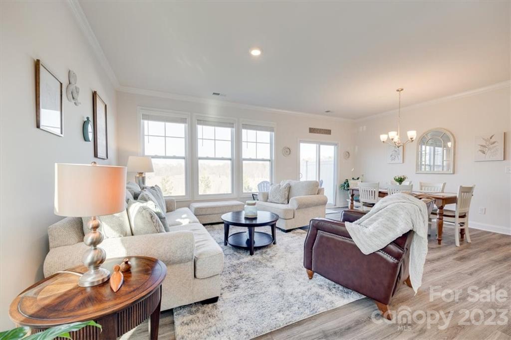 311 Bulrush Rd Lake Lake Wylie, SC 29710 - Photo 10 of 35 a living room with furniture and a large window