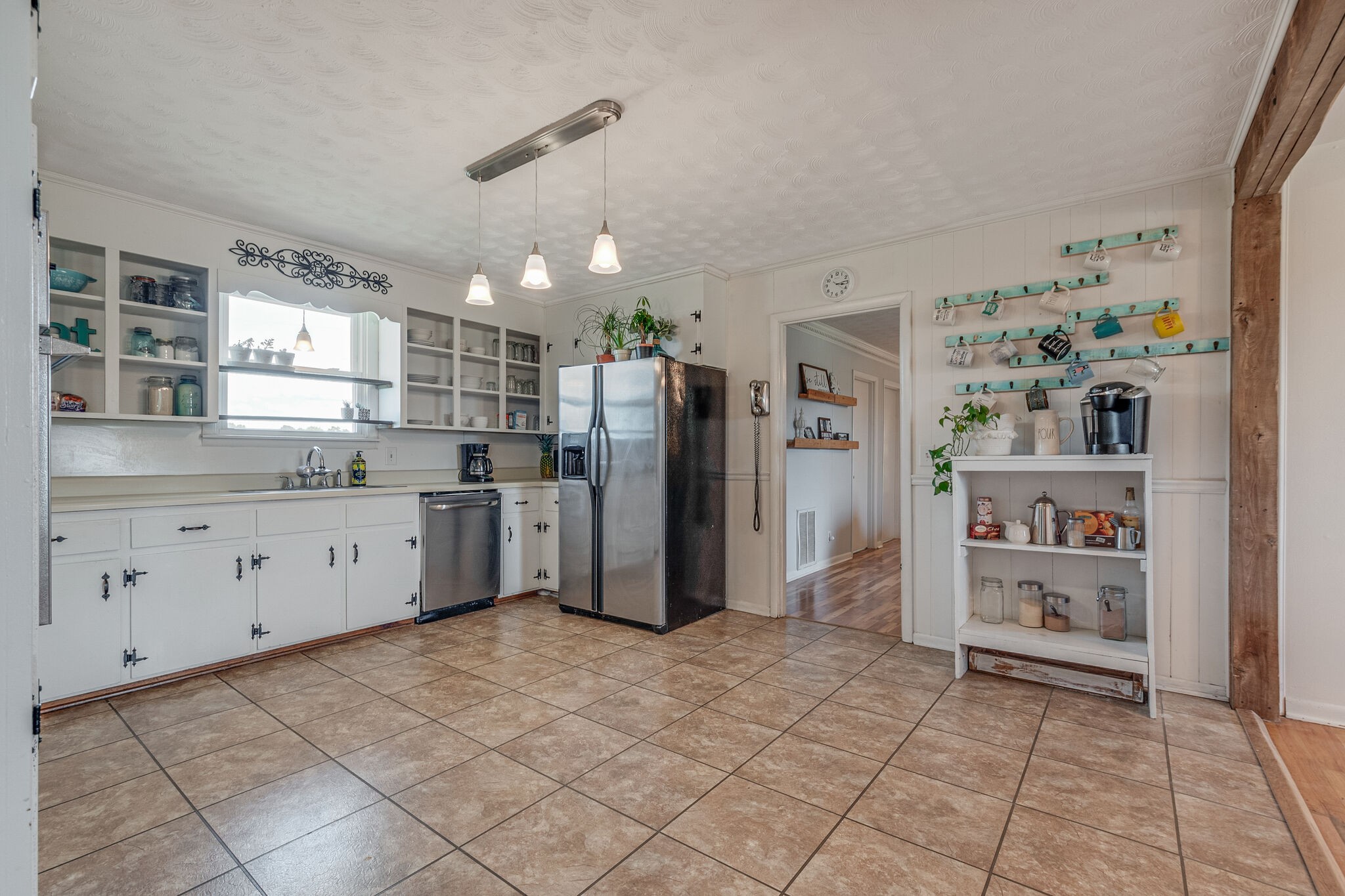 540 Cook Road Portland, TN 37148 - Photo 11 of 32 a kitchen with a refrigerator a sink and cabinets