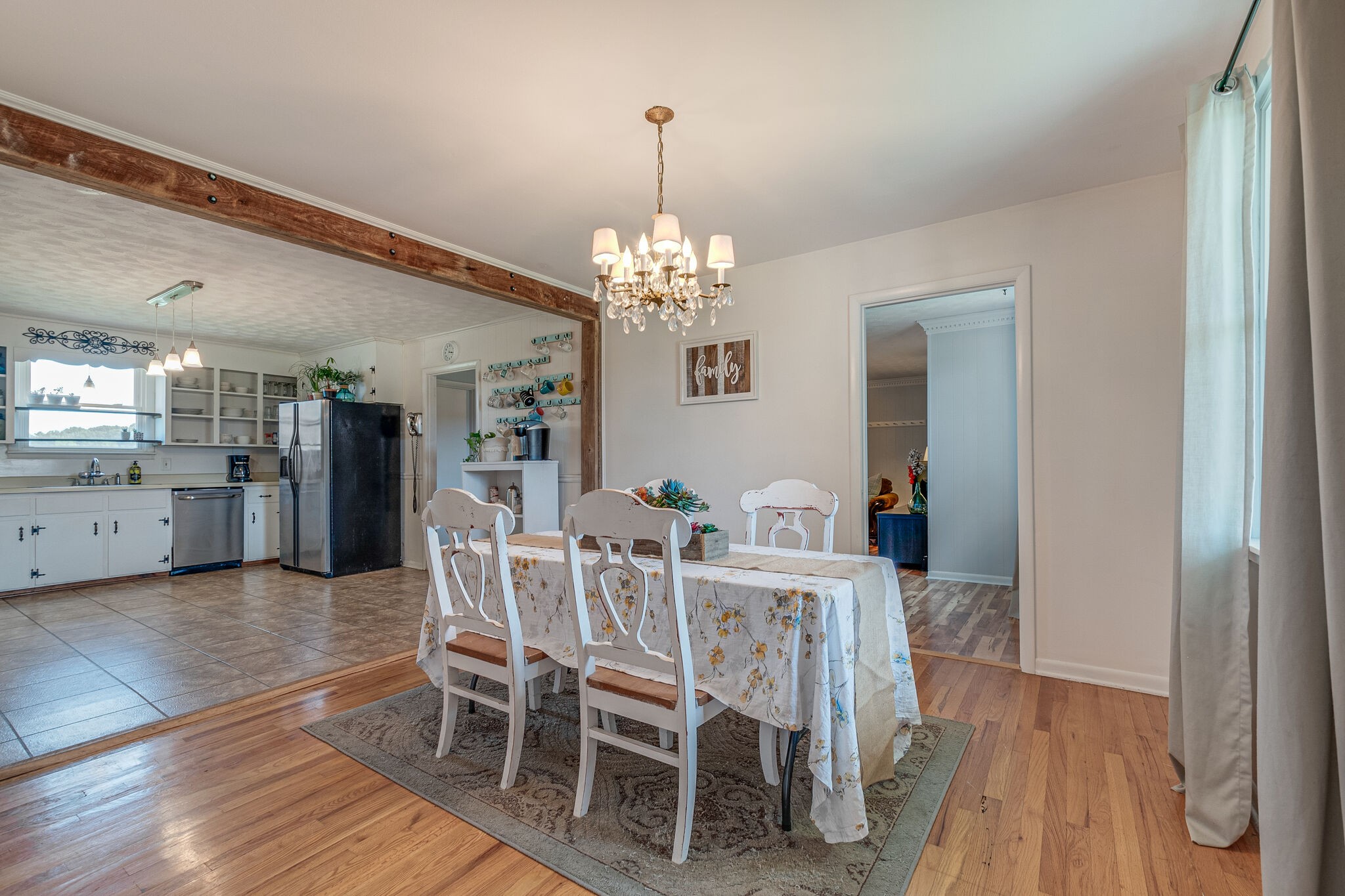 540 Cook Road Portland, TN 37148 - Photo 17 of 32 a view of a dining room with furniture and wooden floor