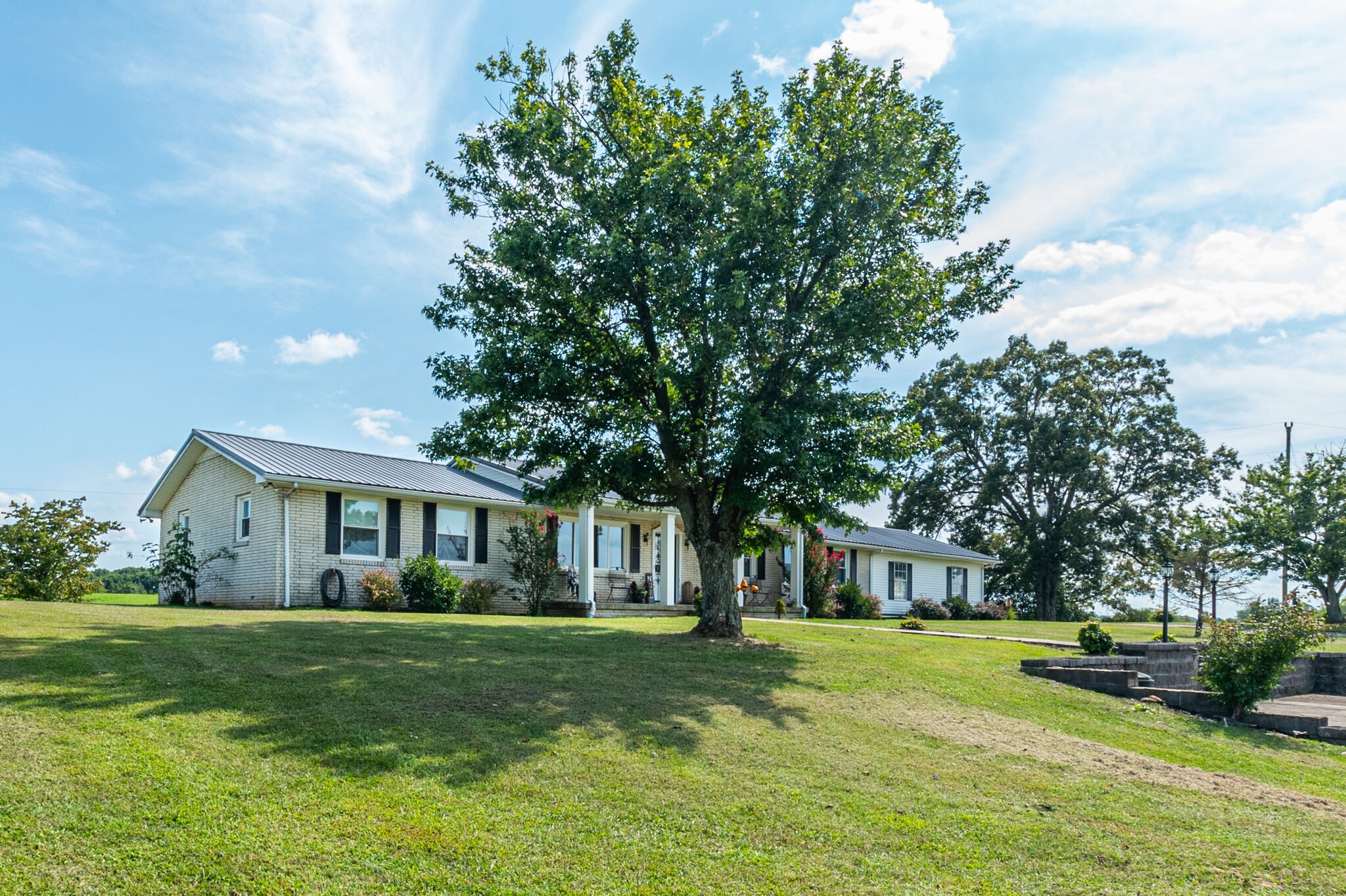 540 Cook Road Portland, TN 37148 - Photo 3 of 32 a front view of a house with a yard