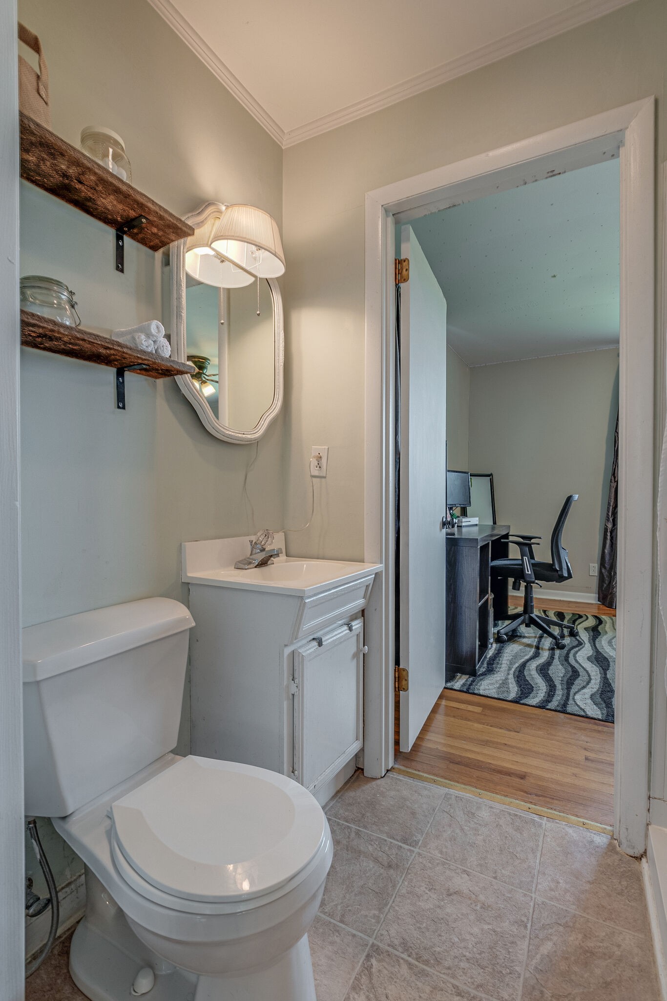 540 Cook Road Portland, TN 37148 - Photo 21 of 32 a bathroom with a toilet a sink and mirror