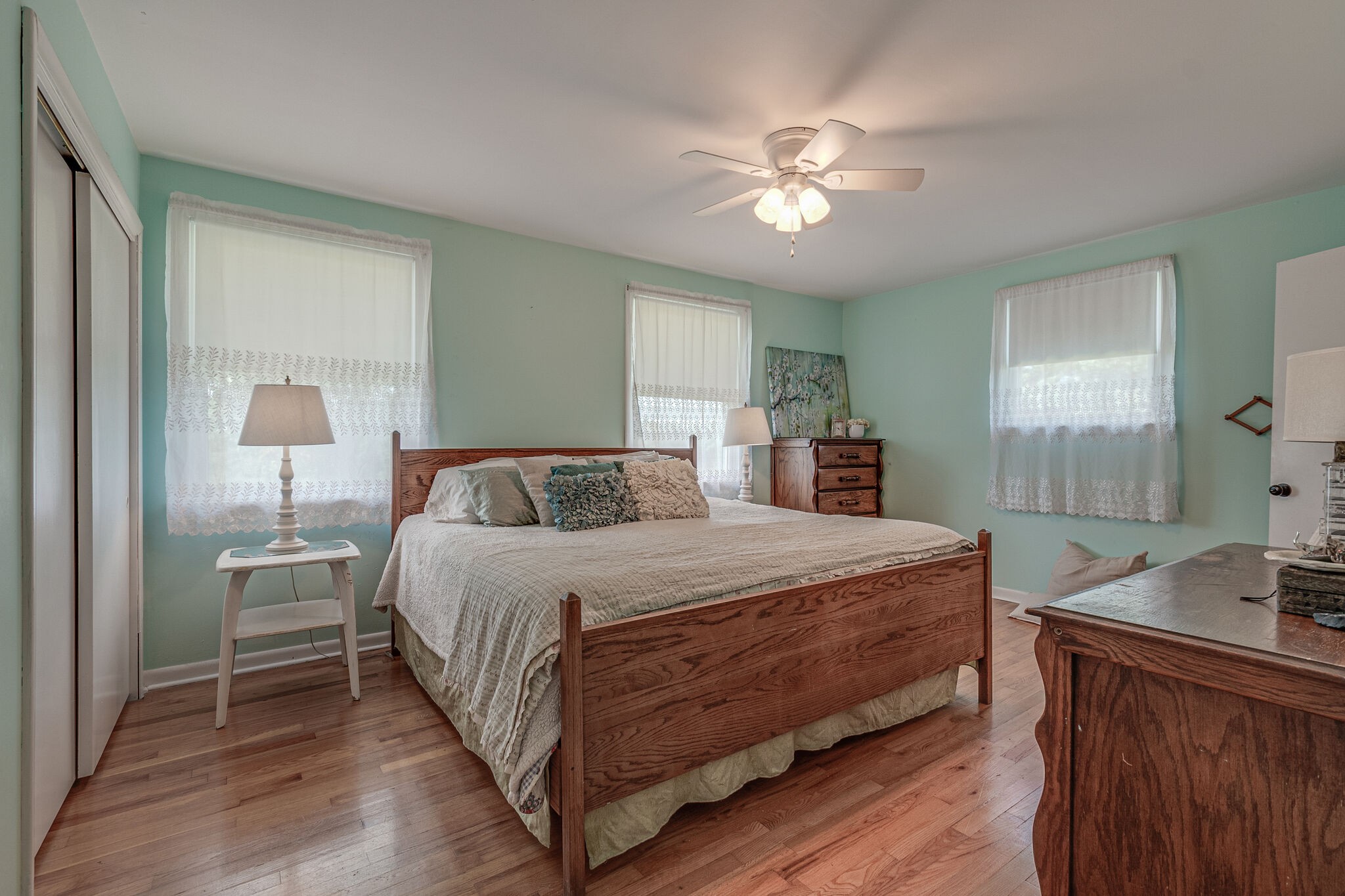 540 Cook Road Portland, TN 37148 - Photo 25 of 32 a spacious bedroom with a bed and a chandelier