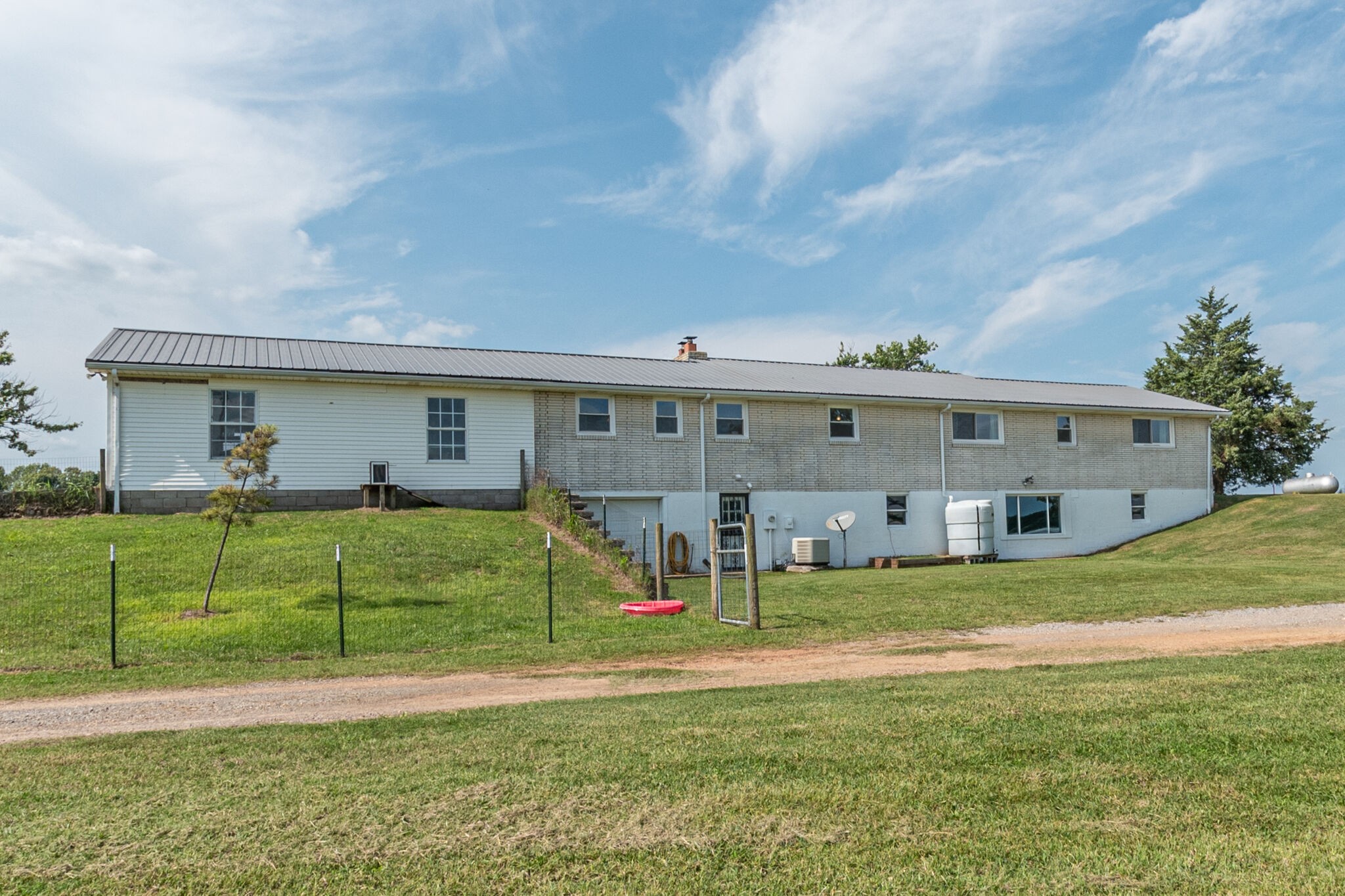 540 Cook Road Portland, TN 37148 - Photo 7 of 32 a view of a house with a backyard