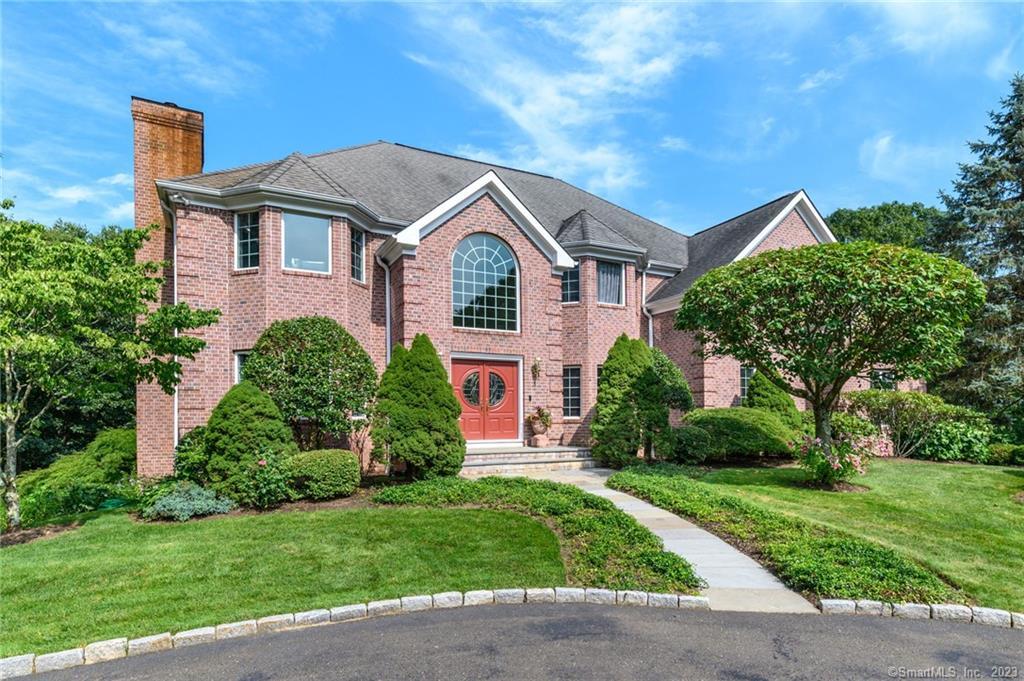 87 Heming Way Stamford, CT 06903 - Photo 1 of 1 a front view of a house with a yard