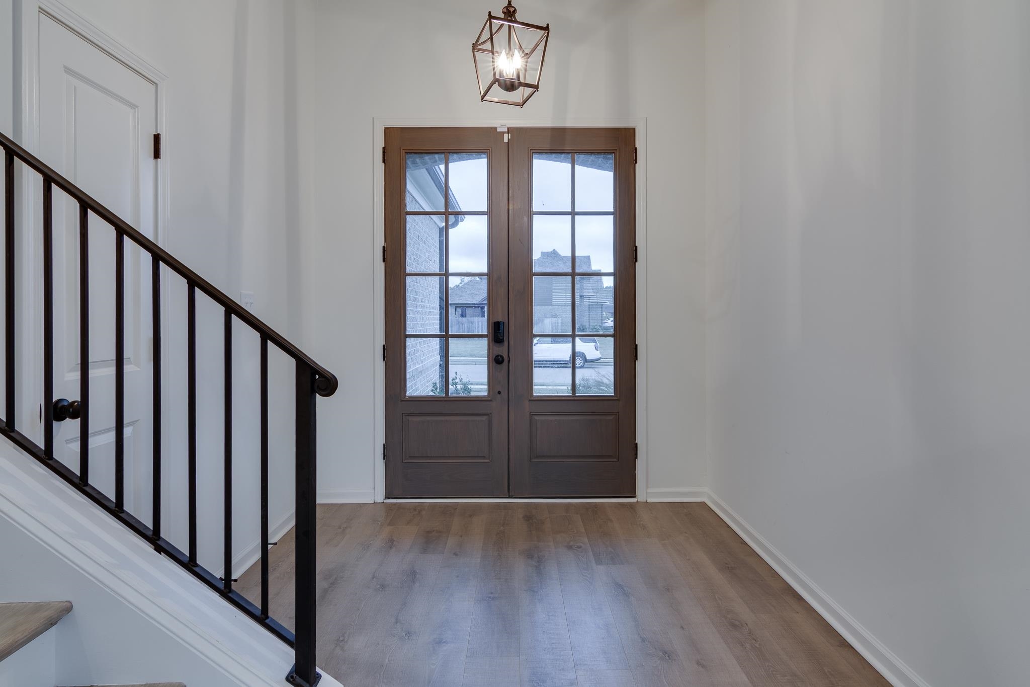 155 Misty Ridge Loop Oakland, TN 38060 - Photo 2 of 26 a view of an entryway with wooden floor