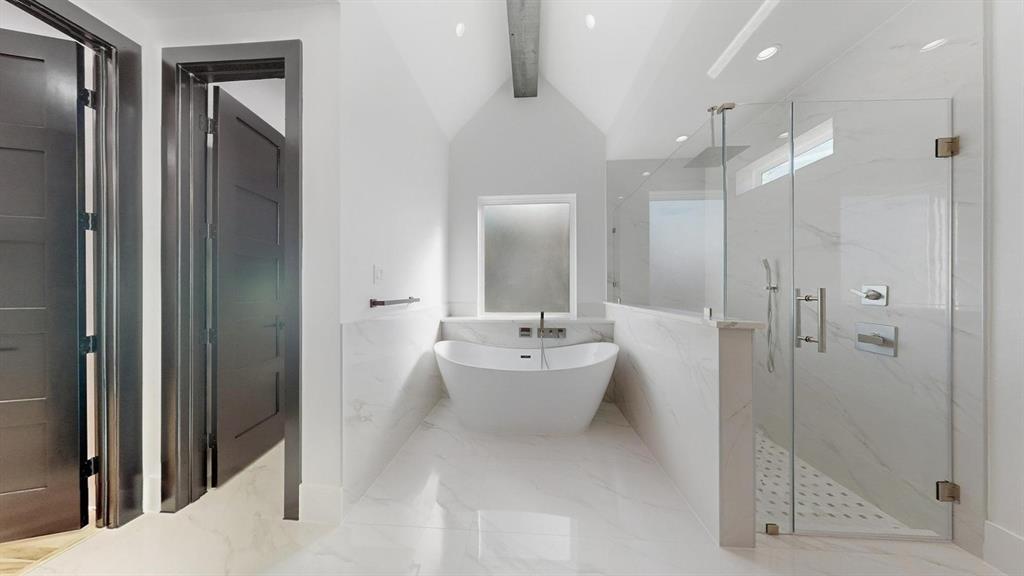 1860 Old Telico Road Ennis, TX 75119 - Photo 27 of 40 a bathroom with a double vanity sink mirror and shower