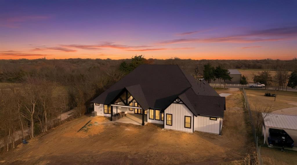 1860 Old Telico Road Ennis, TX 75119 - Photo 36 of 40 a view of a street with a car parked in the background