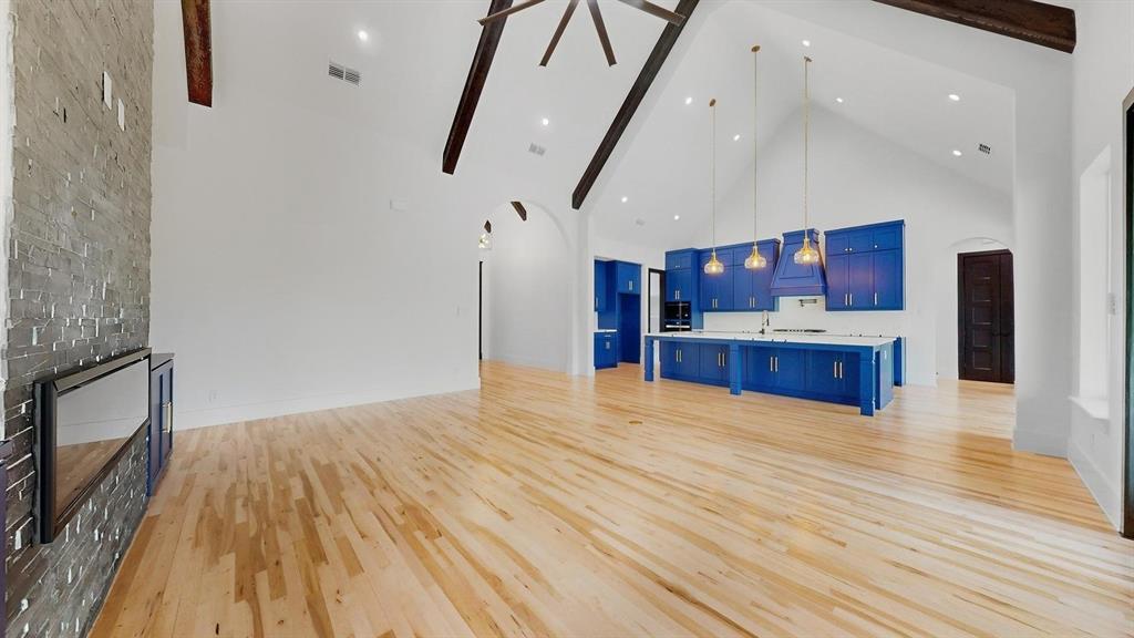1860 Old Telico Road Ennis, TX 75119 - Photo 6 of 40 a view of kitchen and kitchen with furniture wooden floor and window