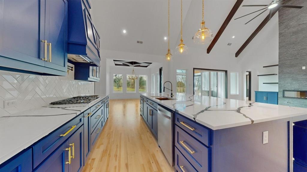 1860 Old Telico Road Ennis, TX 75119 - Photo 8 of 40 a kitchen with a sink stove and cabinets