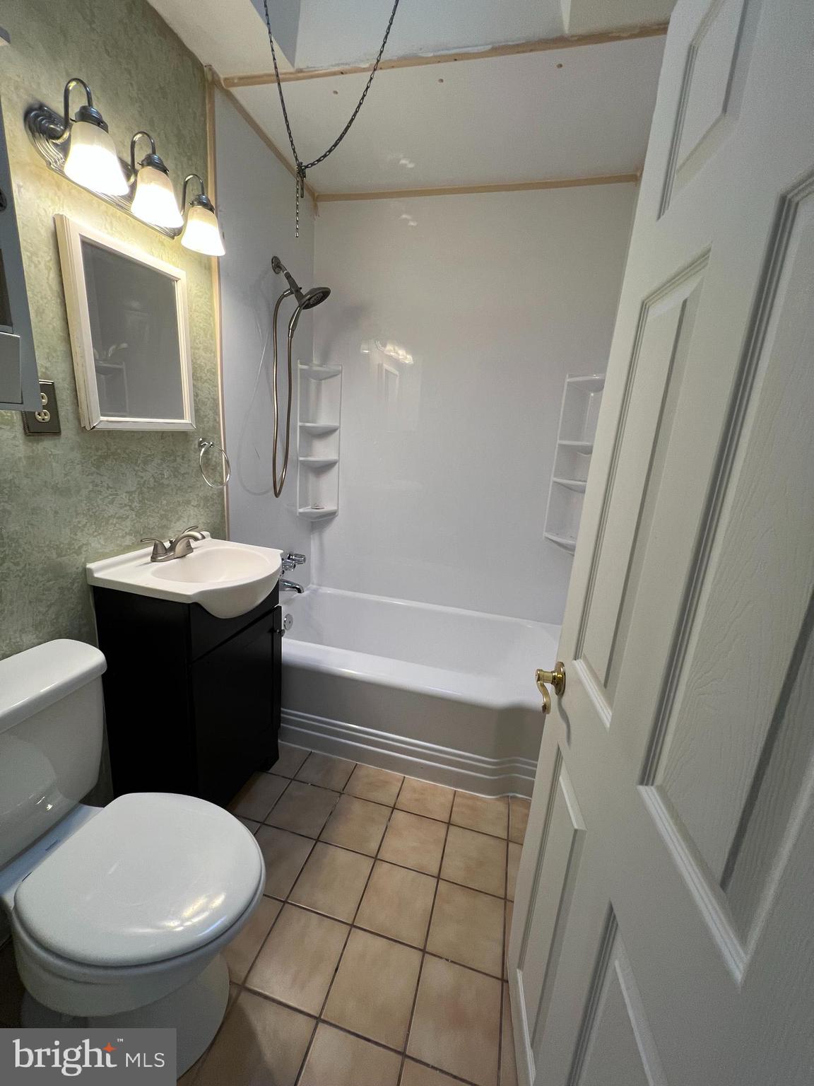 4312 Loring Street Philadelphia, PA 19136 - Photo 12 of 14 a bathroom with a sink toilet and shower