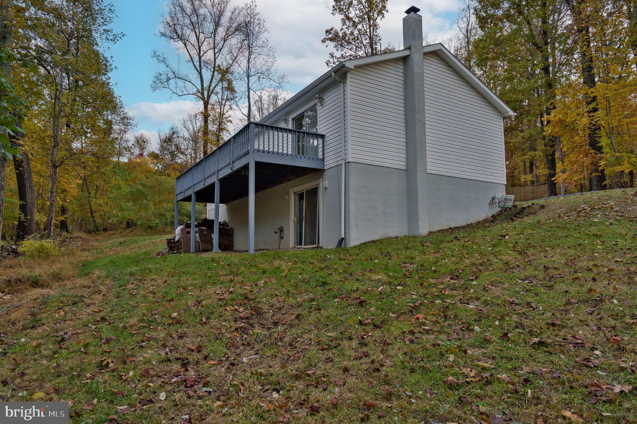 369 Wild Hare Road Harpers Ferry, WV 25425 - Photo 7 of 29 a view of a house with a yard