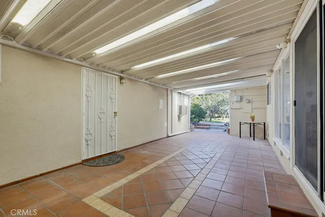 a view of a room with a large window