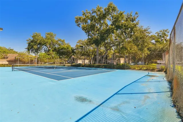 a view of swimming pool with a yard