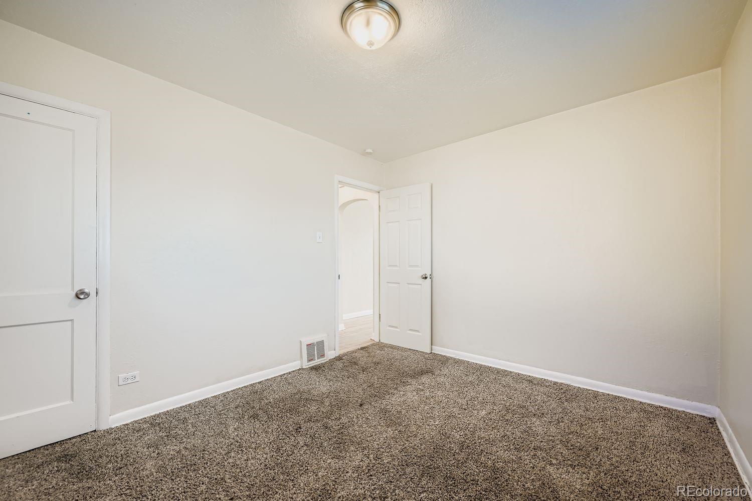 3690 Magnolia Street Denver, CO 80207 - Photo 7 of 17 a view of an empty room