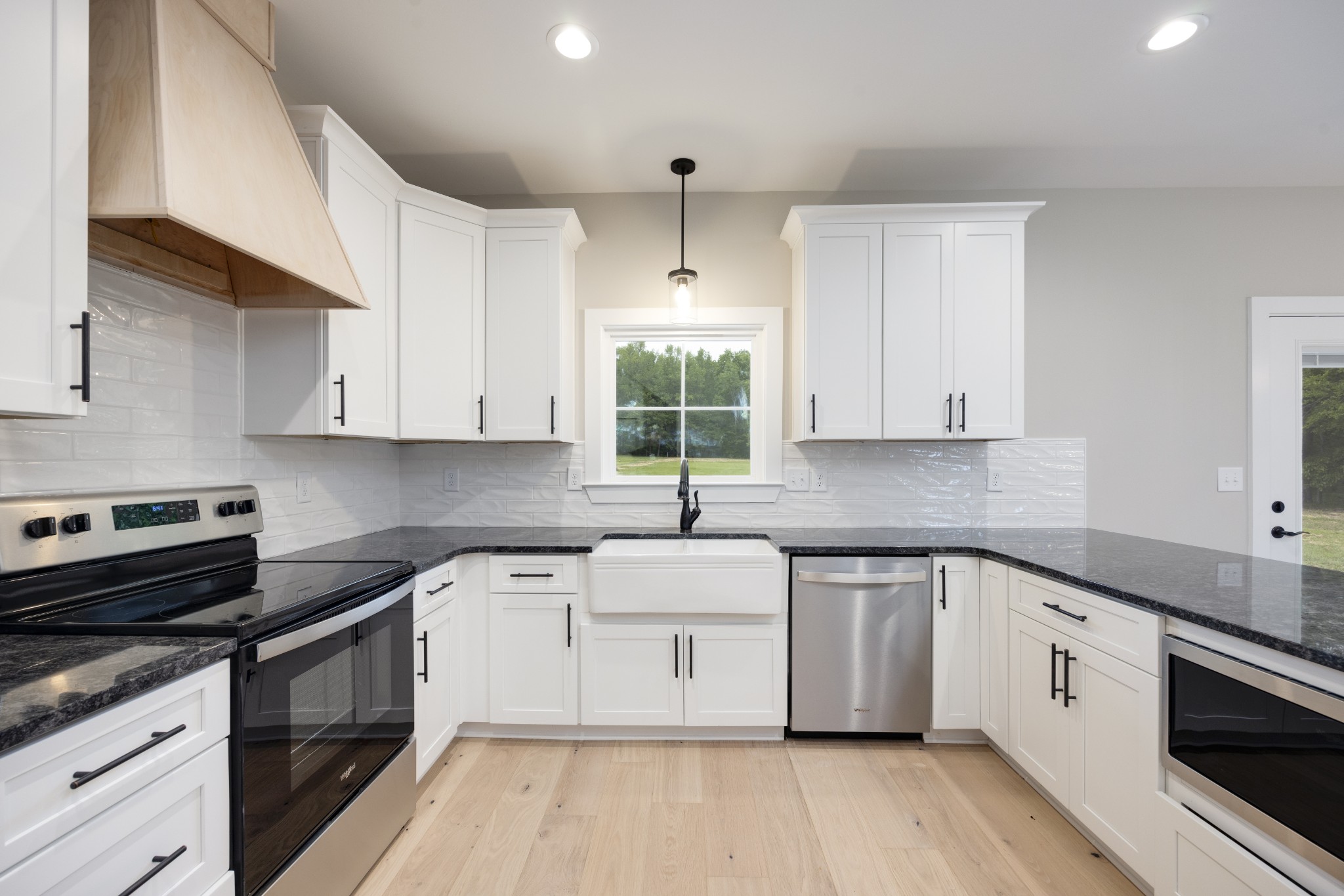 248 Dink Rut Road Portland, TN 37148 - Photo 18 of 41 a white kitchen with sink and cabinets