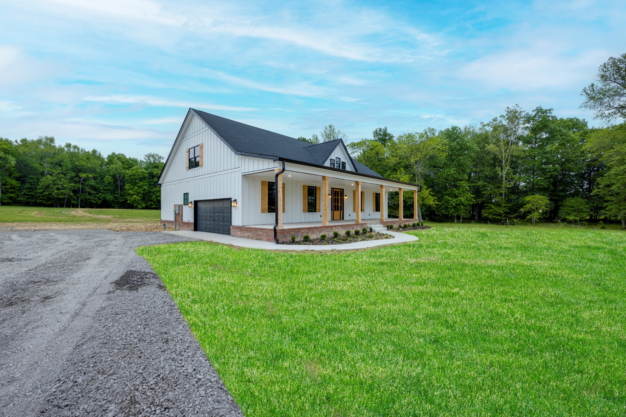 248 Dink Rut Road Portland, TN 37148 - Photo 2 of 41 a front view of house with yard and green space
