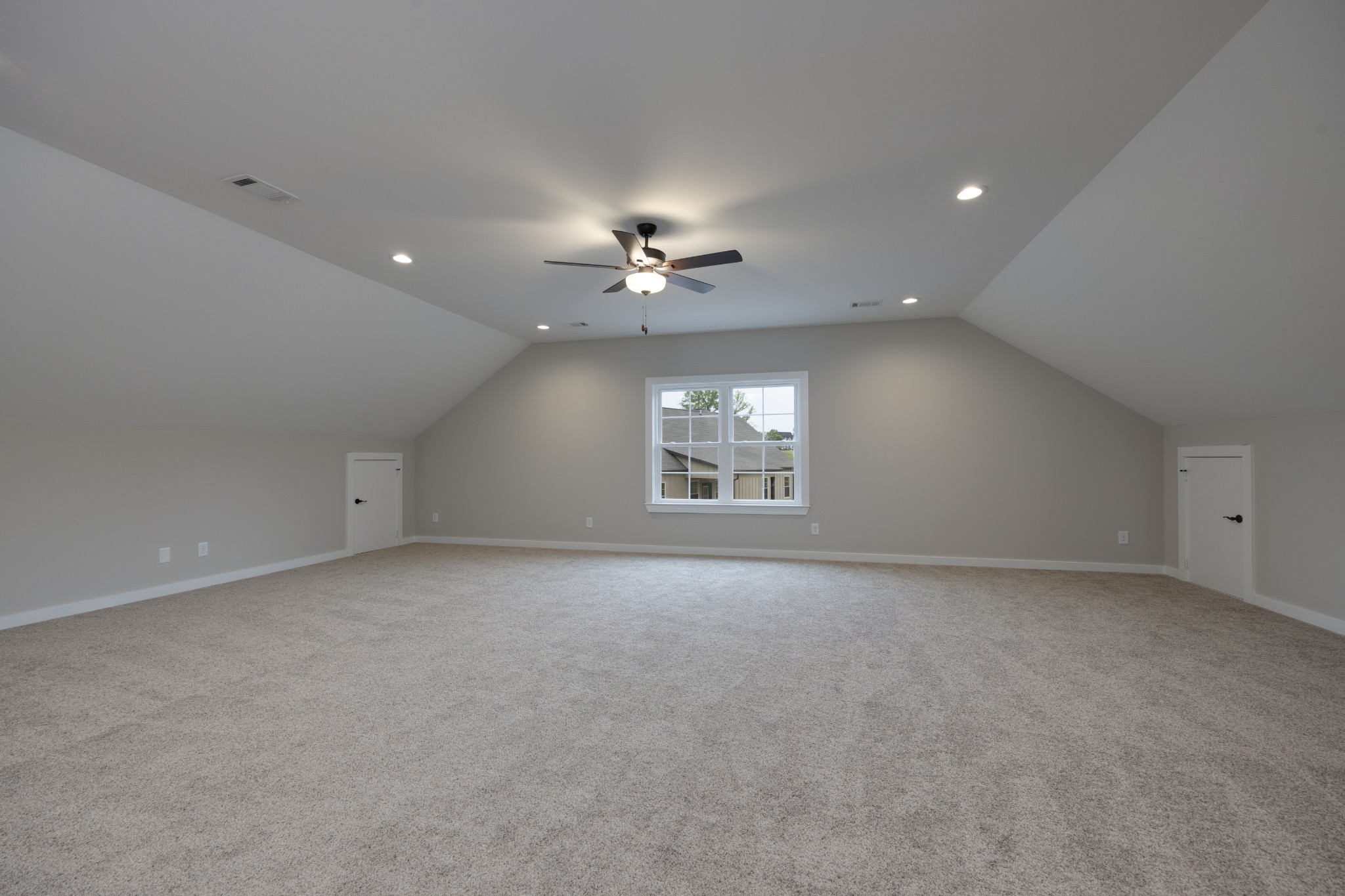 248 Dink Rut Road Portland, TN 37148 - Photo 35 of 41 an empty room with a window and a ceiling fan