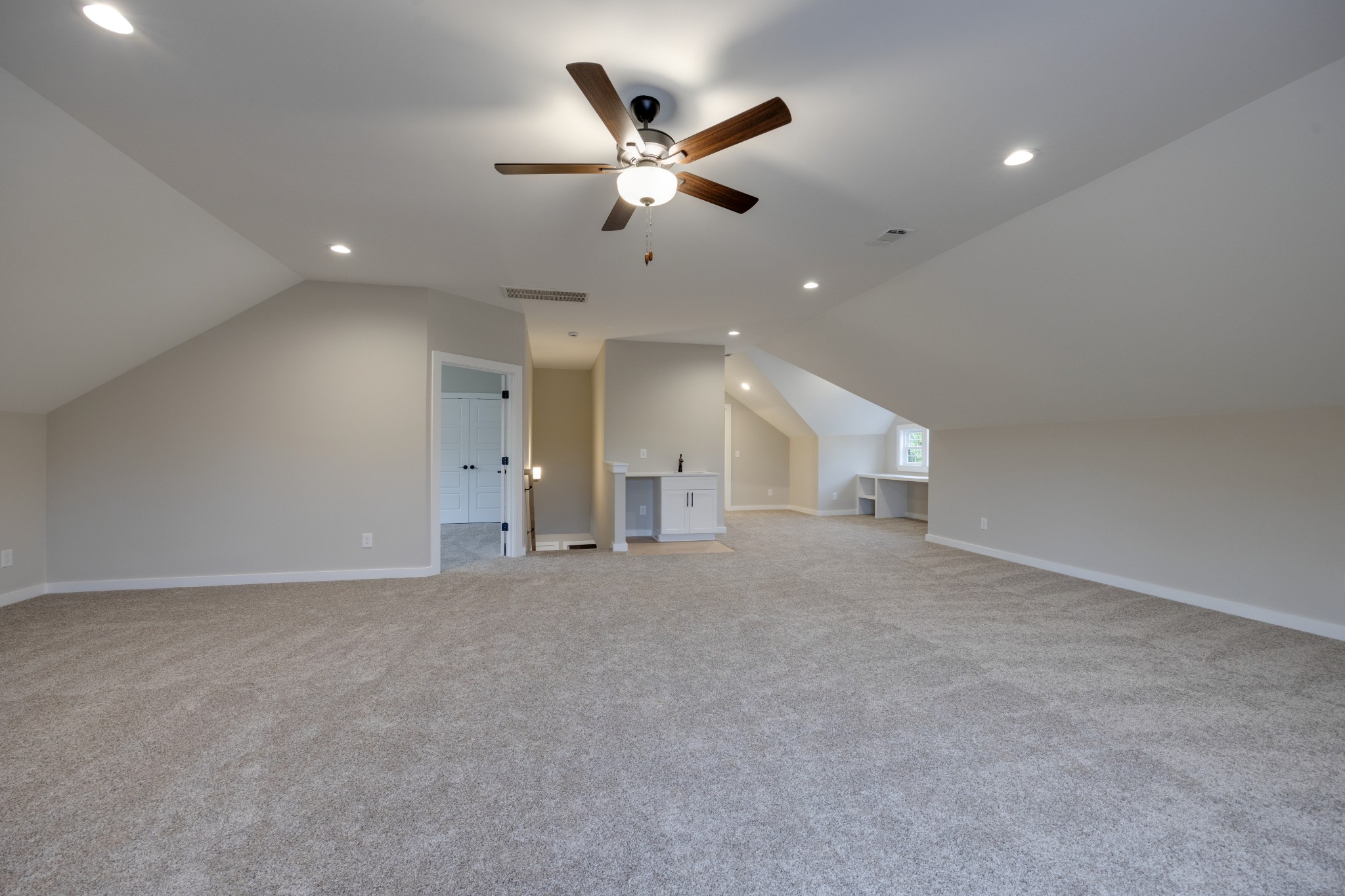 248 Dink Rut Road Portland, TN 37148 - Photo 36 of 41 a view of an empty room with a ceiling fan and window