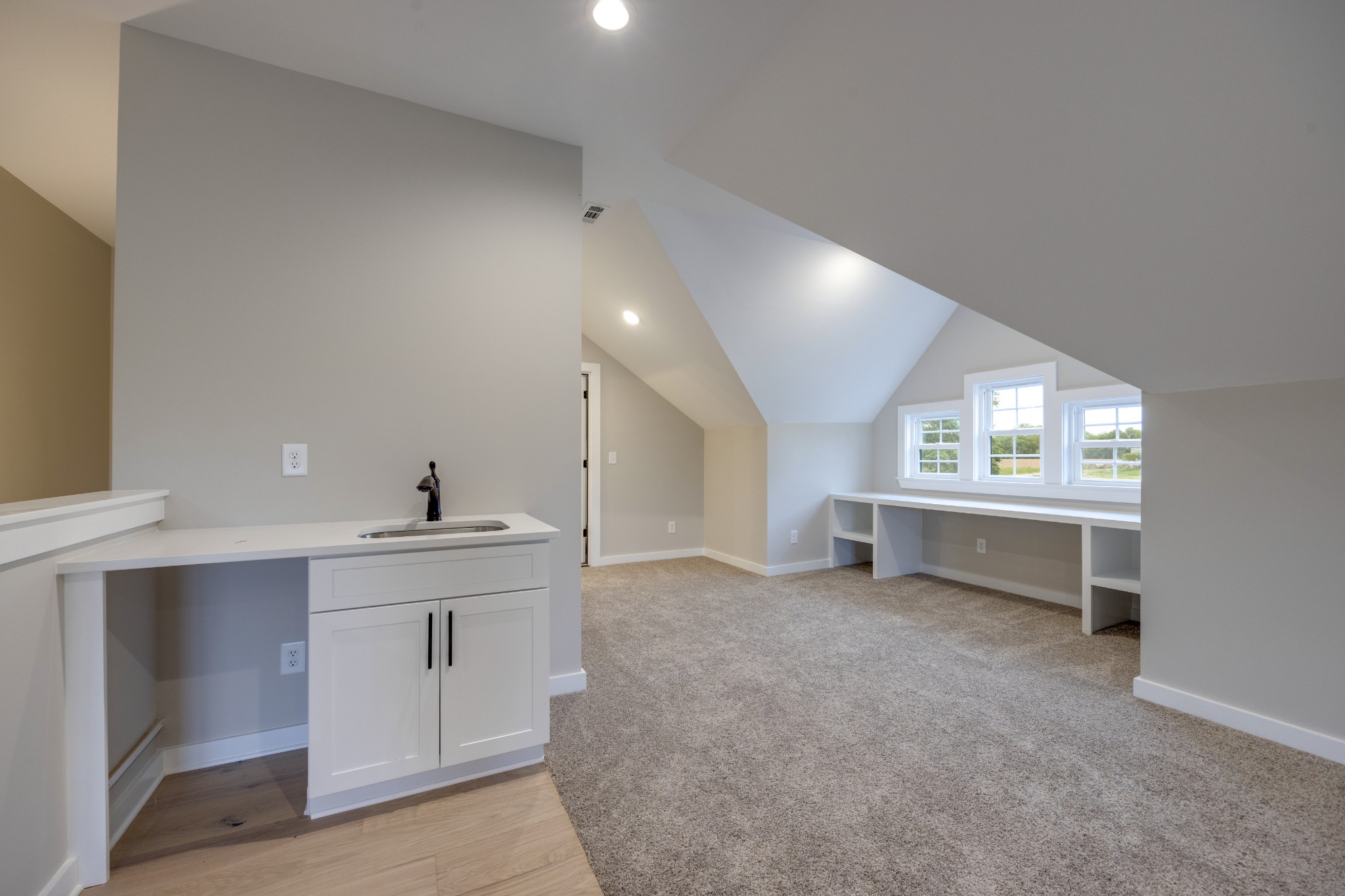248 Dink Rut Road Portland, TN 37148 - Photo 37 of 41 a view of an empty room with a window and a kitchen