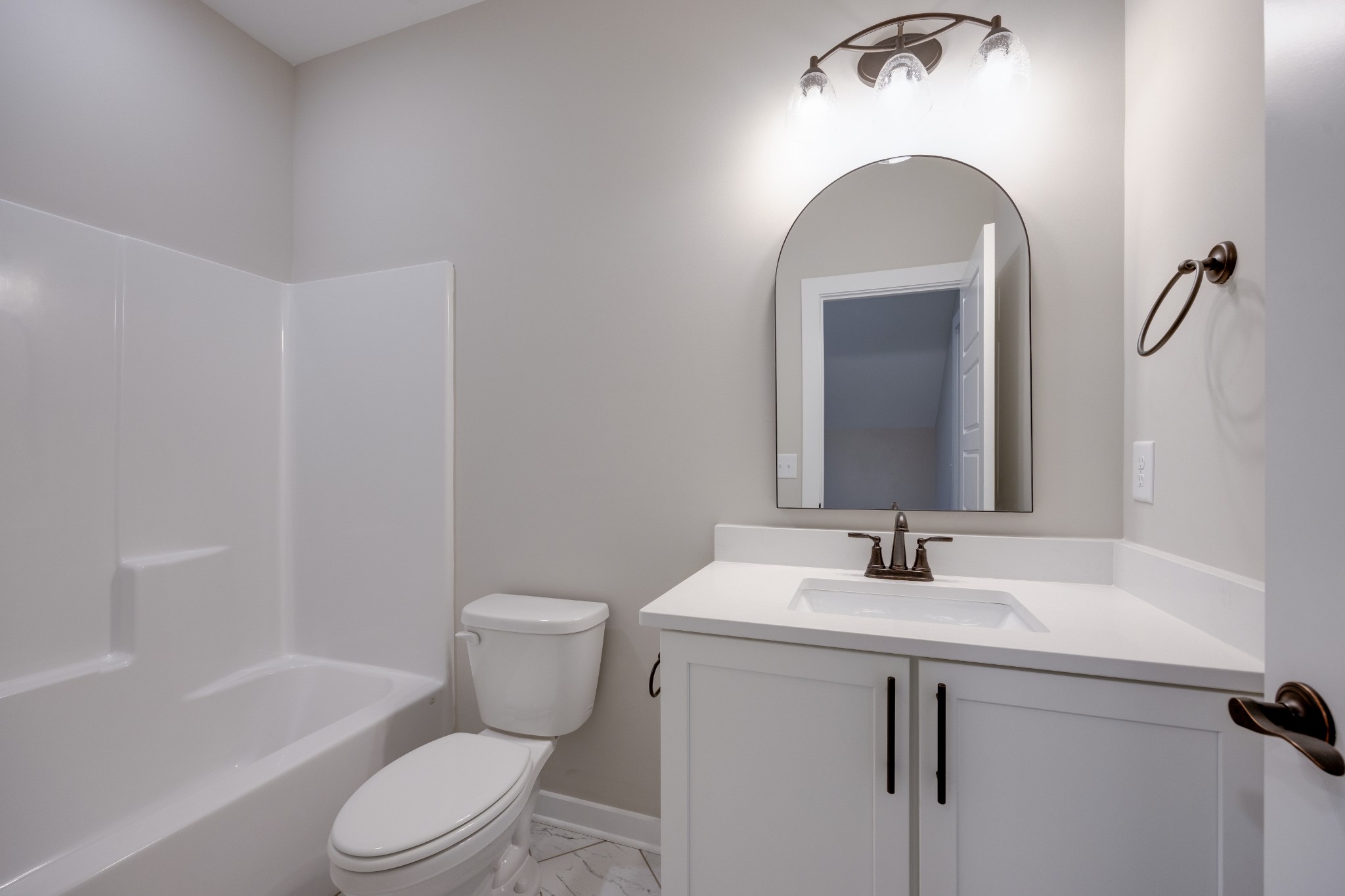 248 Dink Rut Road Portland, TN 37148 - Photo 39 of 41 a bathroom with a sink mirror toilet and bathtub