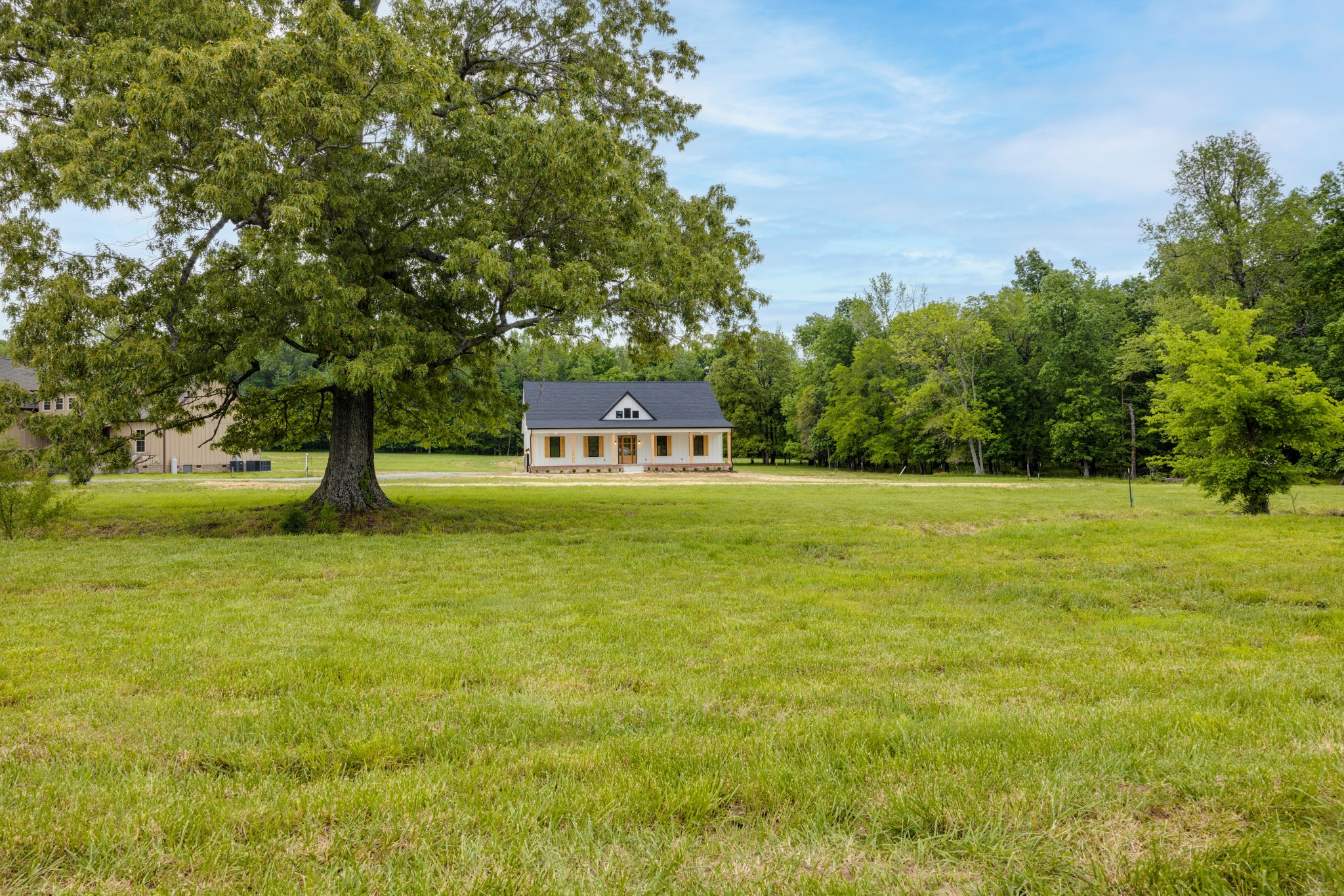 248 Dink Rut Road Portland, TN 37148 - Photo 4 of 41 a house view with swimming pool in front of it