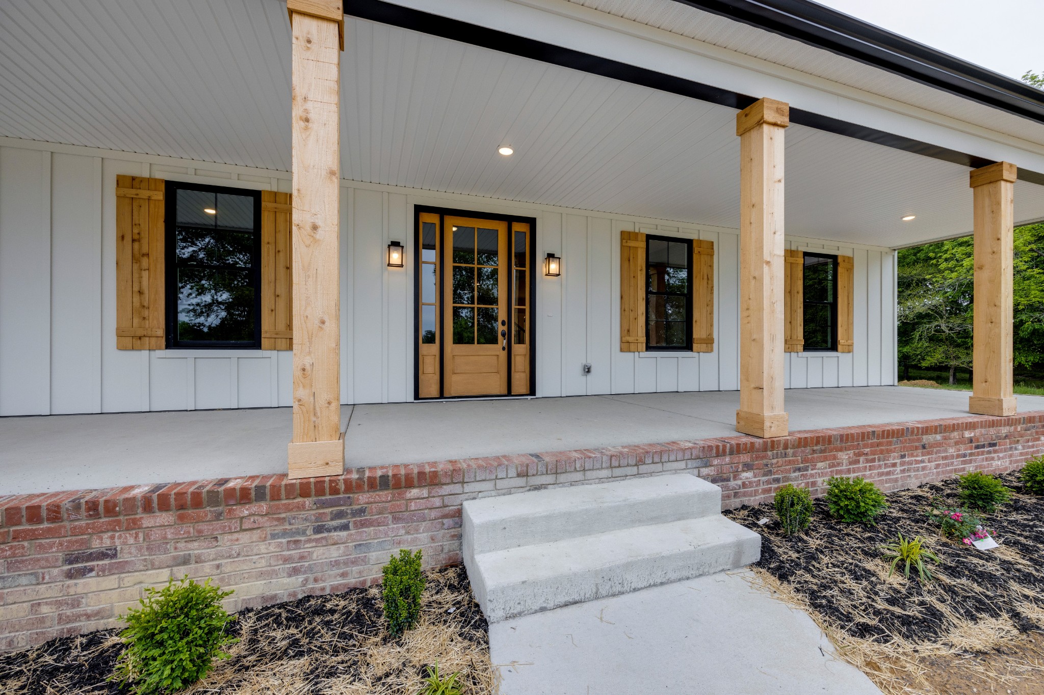 248 Dink Rut Road Portland, TN 37148 - Photo 5 of 41 a front view of a house with garden