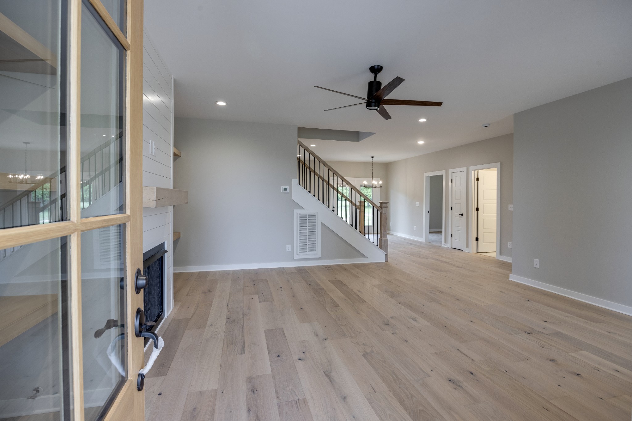 248 Dink Rut Road Portland, TN 37148 - Photo 9 of 41 a view of a hallway with wooden floor and entryway