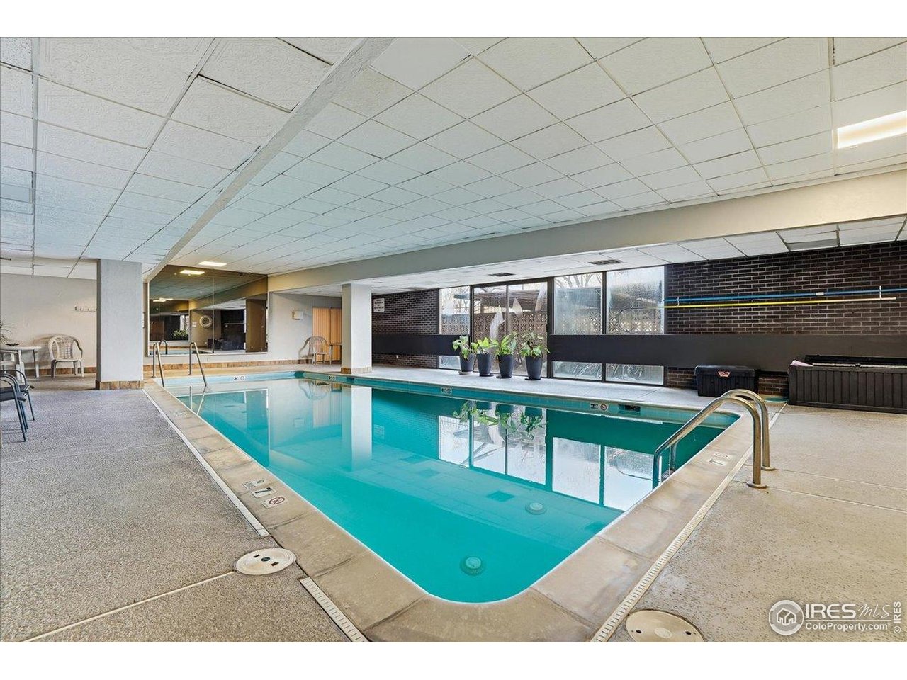 415 South Howes Street, Unit N206 Fort Collins, CO 80521 - Photo 27 of 48 a view of a living room and kitchen
