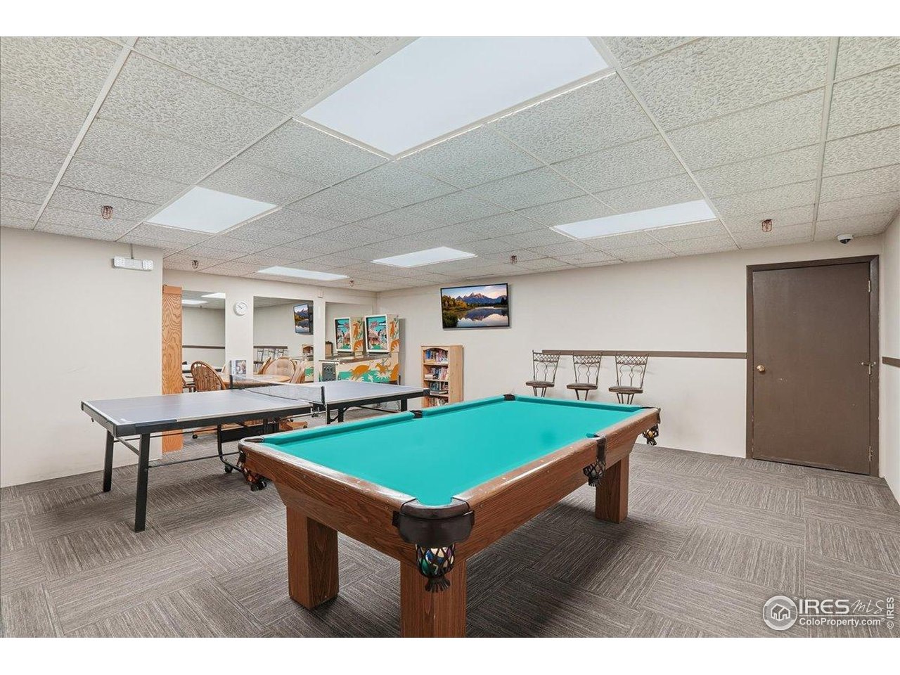 415 South Howes Street, Unit N206 Fort Collins, CO 80521 - Photo 31 of 48 a room with furniture pool table and windows