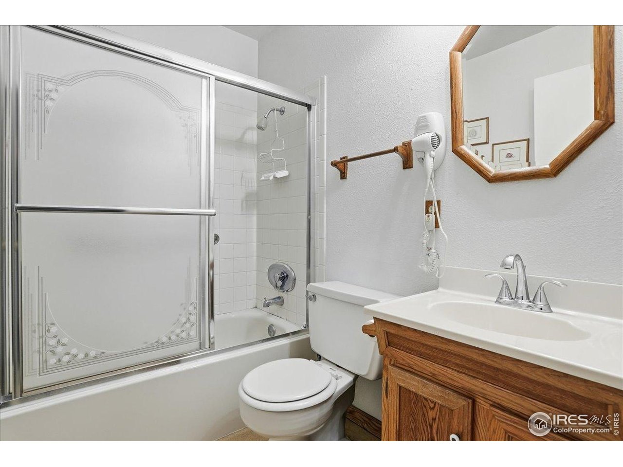 415 South Howes Street, Unit N206 Fort Collins, CO 80521 - Photo 42 of 48 a bathroom with a sink toilet and shower