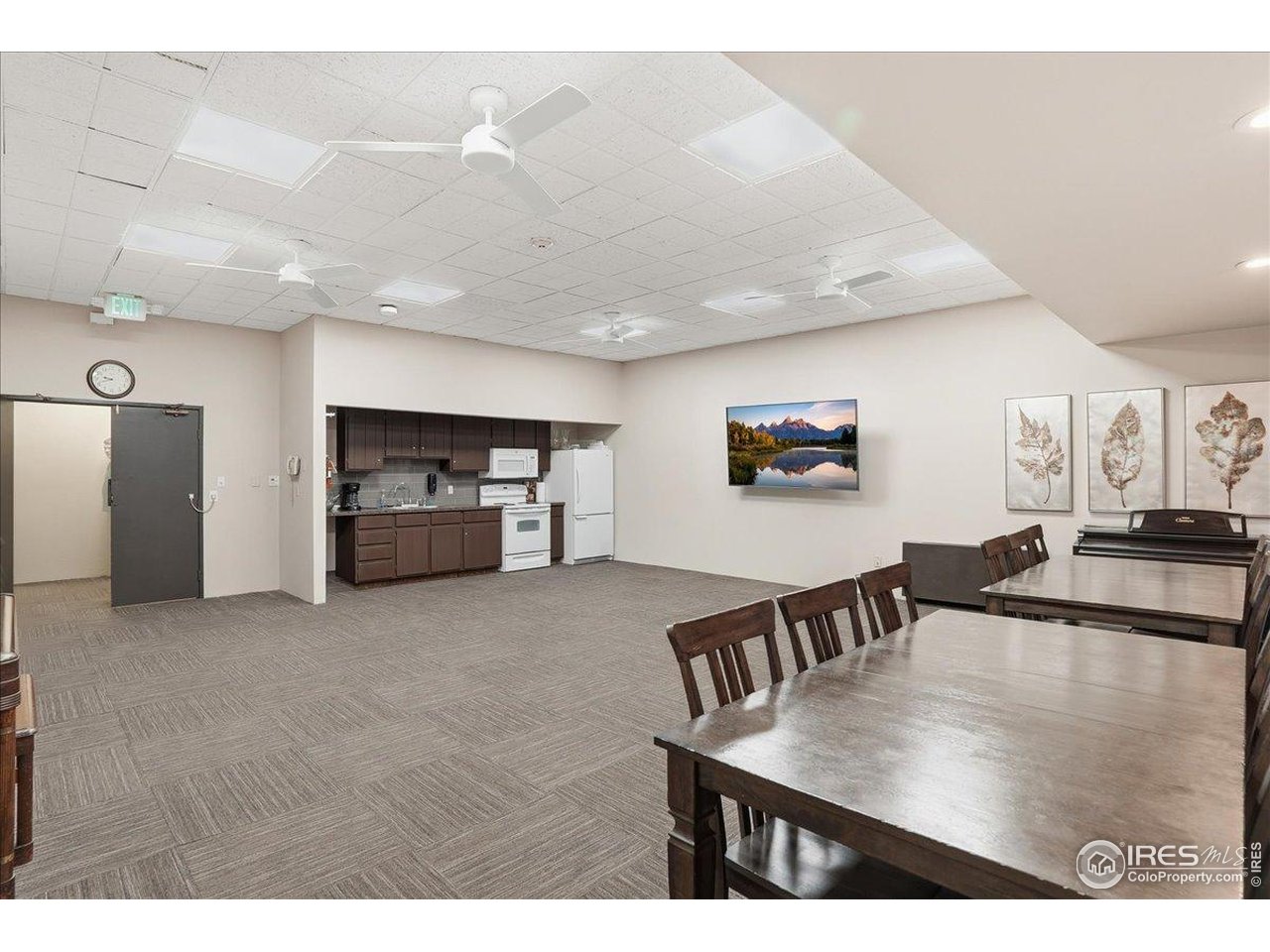 415 South Howes Street, Unit N206 Fort Collins, CO 80521 - Photo 44 of 48 a view of a dining room with furniture and wooden floor
